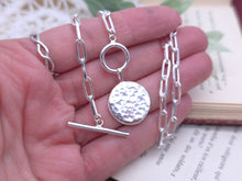 Load image into Gallery viewer, Sterling Silver Hammered Medallion Coin Front Clasp Necklace
