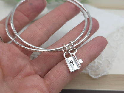 Sterling Silver Intertwined Lock & Key Bangle Set