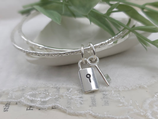 Sterling Silver Intertwined Lock & Key Bangle Set