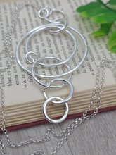 Load image into Gallery viewer, Long Sterling Silver Circle Ring Necklace / Multi Circle Pendant Necklace / Layering Necklace
